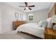 Bedroom with a king-sized bed, carpeted floors, and natural light at 526 Colony Woods Dr, Chapel Hill, NC 27517