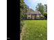 Beautiful two-story home with brick and siding exterior, manicured lawn, and mature trees at 5317 Deep Valley, Raleigh, NC 27606