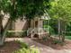 Charming brick home featuring a cozy front porch with white railings and brick walkway at 5317 Deep Valley, Raleigh, NC 27606