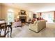 Spacious living room with fireplace, large windows, and comfortable seating offering ample space for relaxation at 5317 Deep Valley, Raleigh, NC 27606