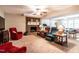 Spacious living room with fireplace, comfortable seating, and ample natural light at 5317 Deep Valley, Raleigh, NC 27606