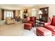 Spacious living room with multiple seating areas, fireplace, and arched windows at 5317 Deep Valley, Raleigh, NC 27606