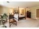 Spacious main bedroom with sitting area and elegant furnishings at 5317 Deep Valley, Raleigh, NC 27606
