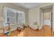 Comfortable bedroom featuring hardwood floors, a large window, and ample space at 533 Opposition Way, Wake Forest, NC 27587