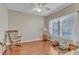 Cozy bedroom with hardwood floors and large windows that provide natural light at 533 Opposition Way, Wake Forest, NC 27587