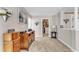 Hallway leading to a walk-in closet, features neutral walls and carpeted floors at 533 Opposition Way, Wake Forest, NC 27587