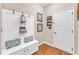 Mudroom features bench, coat rack, storage, and decor at 533 Opposition Way, Wake Forest, NC 27587