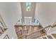 Open two-story foyer with hardwood floors, natural light, and decorative sconces at 533 Opposition Way, Wake Forest, NC 27587