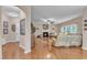 Spacious living room with hardwood floors, fireplace, and comfortable leather seating at 533 Opposition Way, Wake Forest, NC 27587