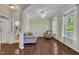 Comfortable living room with hardwood floors, neutral paint, and plenty of natural light at 533 Opposition Way, Wake Forest, NC 27587