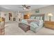 Large main bedroom with carpet, ceiling fan, big bed and walk-in closet at 533 Opposition Way, Wake Forest, NC 27587