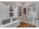 This mudroom features a coat rack, bench seat, decorative pillows, and an elevator at 533 Opposition Way, Wake Forest, NC 27587