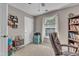 Cozy office room with carpet, great lighting, storage, and room for a desk at 533 Opposition Way, Wake Forest, NC 27587
