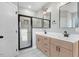 The spacious bathroom features a double sink vanity and walk-in shower at 56 Birchtop Cir, Zebulon, NC 27597