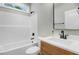 This bathroom boasts a shower-tub combo with black fixtures and wooden vanity at 56 Birchtop Cir, Zebulon, NC 27597