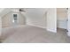 Bonus room featuring carpet flooring, a ceiling fan, window with view, and closet at 56 Birchtop Cir, Zebulon, NC 27597