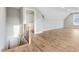 This spacious bonus room has wood-look flooring, a closet, and natural light at 56 Birchtop Cir, Zebulon, NC 27597
