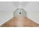 This is a spacious bonus room with recessed lighting and wood-look floors at 56 Birchtop Cir, Zebulon, NC 27597