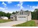 Lovely home with a well-kept lawn, great curb appeal, and an attached two-car garage at 56 Birchtop Cir, Zebulon, NC 27597