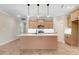 Modern kitchen featuring an island, stainless steel appliances, and pendant lighting at 56 Birchtop Cir, Zebulon, NC 27597