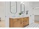 Elegant bathroom with double sinks, modern fixtures, and a spacious walk-in shower at 596 Oaks Lane Rd, Timberlake, NC 27583