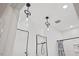 Bathroom showcasing glass pendant lights above the vanity, unique mirrors, and modern fixtures at 596 Oaks Lane Rd, Timberlake, NC 27583