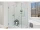 Beautiful bathroom featuring a modern shower, and a standalone soaking tub at 596 Oaks Lane Rd, Timberlake, NC 27583