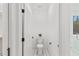 Neat bathroom with toilet, tile floor, and window at 596 Oaks Lane Rd, Timberlake, NC 27583