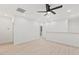 Open bonus room features light walls and wood-look floors with a ceiling fan at 596 Oaks Lane Rd, Timberlake, NC 27583