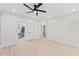 Spacious bonus room features light walls and wood-look floors with natural lighting at 596 Oaks Lane Rd, Timberlake, NC 27583