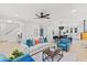 Open living area with stylish furniture, a modern ceiling fan, and adjacent dining at 596 Oaks Lane Rd, Timberlake, NC 27583