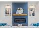 Elegant living room showcasing a modern fireplace, stylish lighting, and chic decor at 596 Oaks Lane Rd, Timberlake, NC 27583
