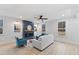 Bright living room featuring fireplace, modern furniture, and abundant natural light at 596 Oaks Lane Rd, Timberlake, NC 27583