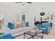 Open-concept living area with stylish furniture, a ceiling fan, and a view of the dining space at 596 Oaks Lane Rd, Timberlake, NC 27583