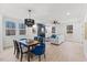 Bright, open-concept living space with a dining area, fireplace, and comfortable seating with nice natural light at 596 Oaks Lane Rd, Timberlake, NC 27583