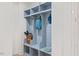 Built-in mudroom cubbies offer storage, seating, and organizational space by the entryway at 596 Oaks Lane Rd, Timberlake, NC 27583