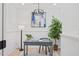 Cozy home office with desk, stylish lamp, wainscotting and decorative decor at 596 Oaks Lane Rd, Timberlake, NC 27583