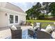 Relaxing deck with patio furniture, outdoor seating, and backyard views at 608 Elin Ct, Hillsborough, NC 27278