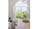 Well-lit dining room showcasing an arched window with lovely natural light and modern accents at 608 Elin Ct, Hillsborough, NC 27278