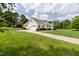Charming single-Gathering home with a lush lawn, attached garage, and a long driveway at 608 Elin Ct, Hillsborough, NC 27278