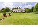 Inviting home with beautifully manicured lawn and well-maintained landscaping at 608 Elin Ct, Hillsborough, NC 27278