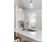 Gourmet kitchen sink area has quartz countertops and updated stainless steel fixtures at 608 Elin Ct, Hillsborough, NC 27278