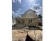 Charming home featuring a covered porch, a classic gable roof, and unfinished landscaping at 618 Price Ave, Durham, NC 27701