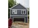 New construction featuring a two-story garage with ample space for vehicles and storage at 618 Price Ave, Durham, NC 27701