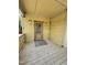 Covered porch featuring wood flooring, matching wood railing, and a wood front door at 618 Price Ave, Durham, NC 27701
