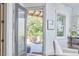 Inviting entryway leading to a well-landscaped outdoor area, complemented by a stylish interior at 631 Linfield Dr, Durham, NC 27701