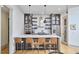 Modern kitchen with stainless steel appliances, white countertops, and seating at the island at 631 Linfield Dr, Durham, NC 27701
