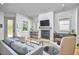 Inviting living room with a modern fireplace, stylish furniture, and elegant decor at 631 Linfield Dr, Durham, NC 27701