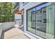 View of the side patio and sliding glass doors at 631 Linfield Dr, Durham, NC 27701