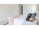 Cozy bedroom showcasing a neatly made bed, accent pillows, and soft neutral tones, creating a relaxing atmosphere at 642 The Parks Dr, Pittsboro, NC 27312